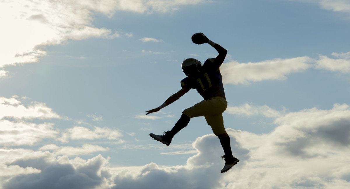 teenage american football player