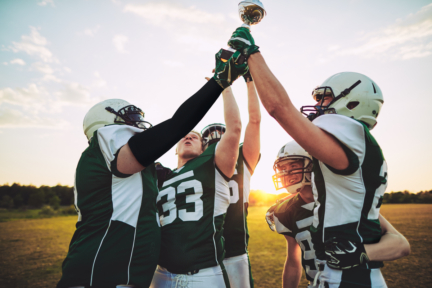 cheering american football team