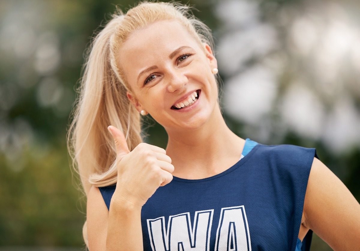 thumbs ups netball and sports wo