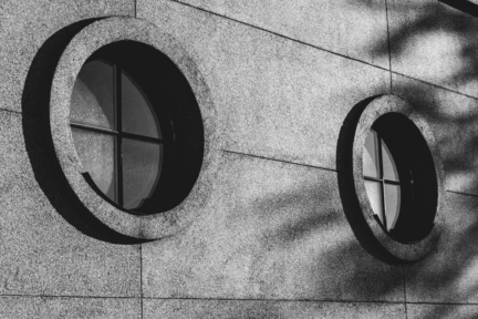 grayscale of round modern window