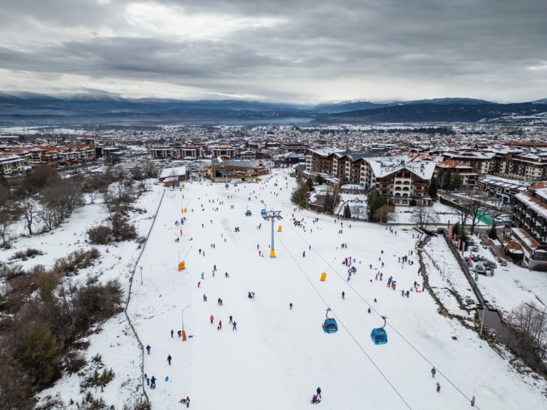 skiers enjoy a snowy day at the
