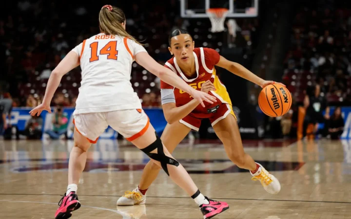 college basketball player in game action