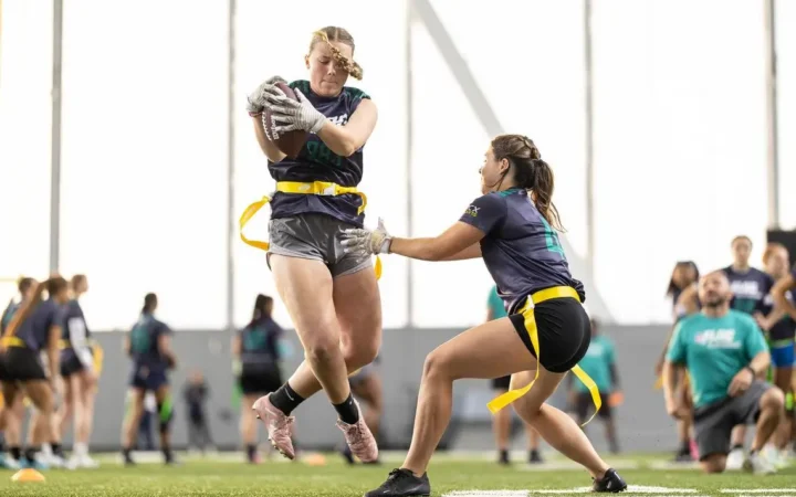 women's college flag football action