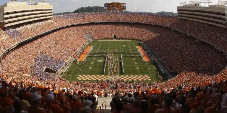 College athletes competing in a stadium during a game